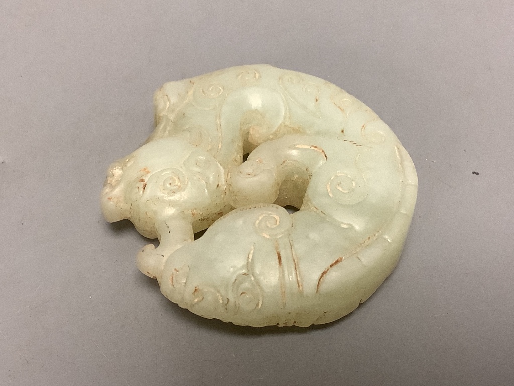 A Chinese ivory figure and a bowenite jade carving